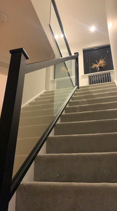 Staircase with glass balustrade