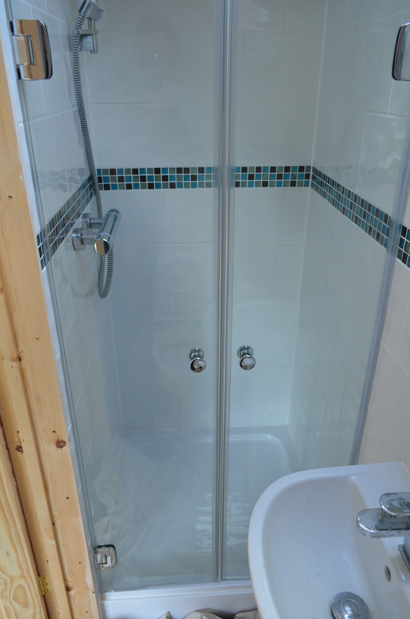 double shower doors in small bathroom