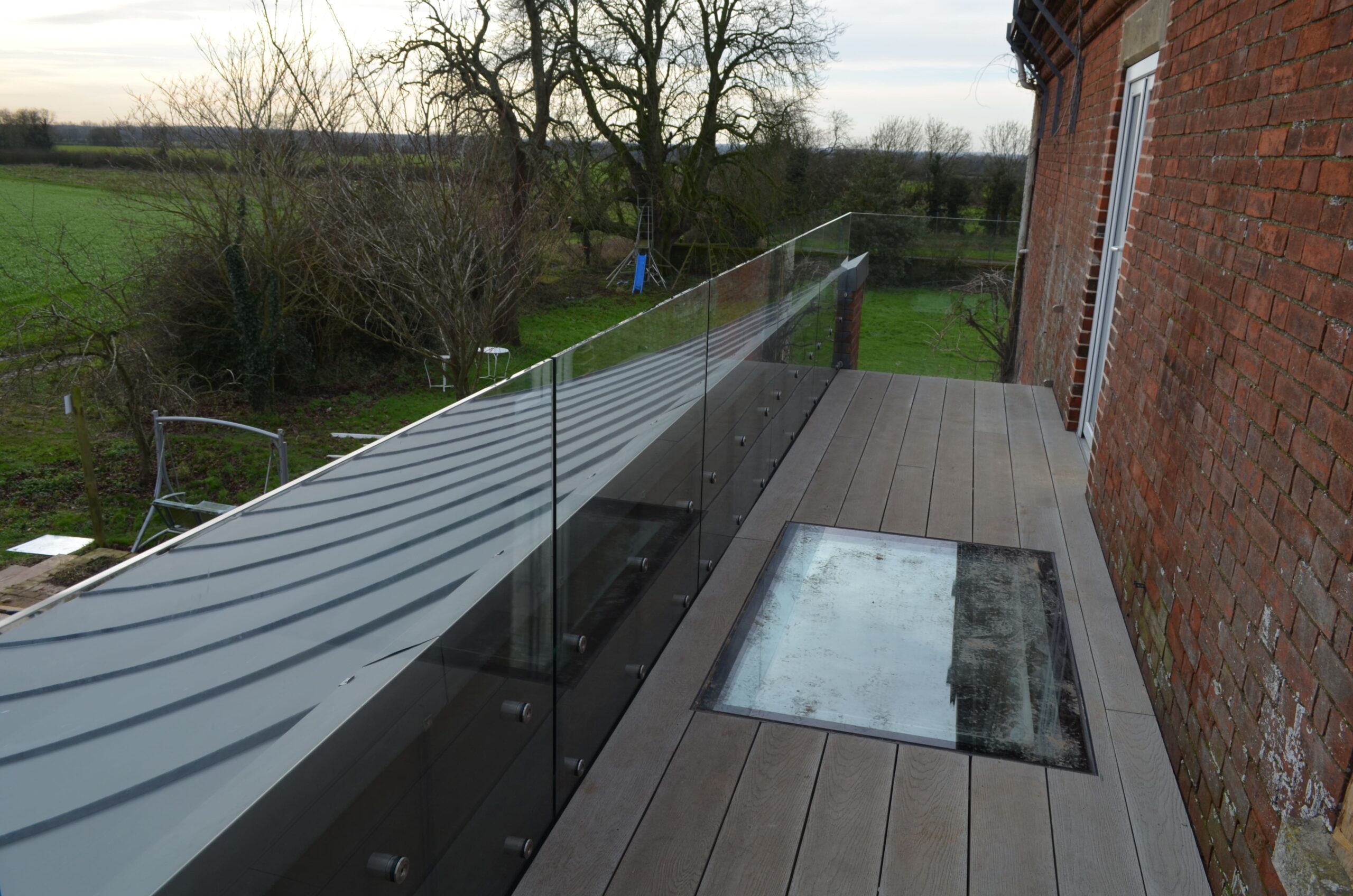 wraparound walk on balcony with glass