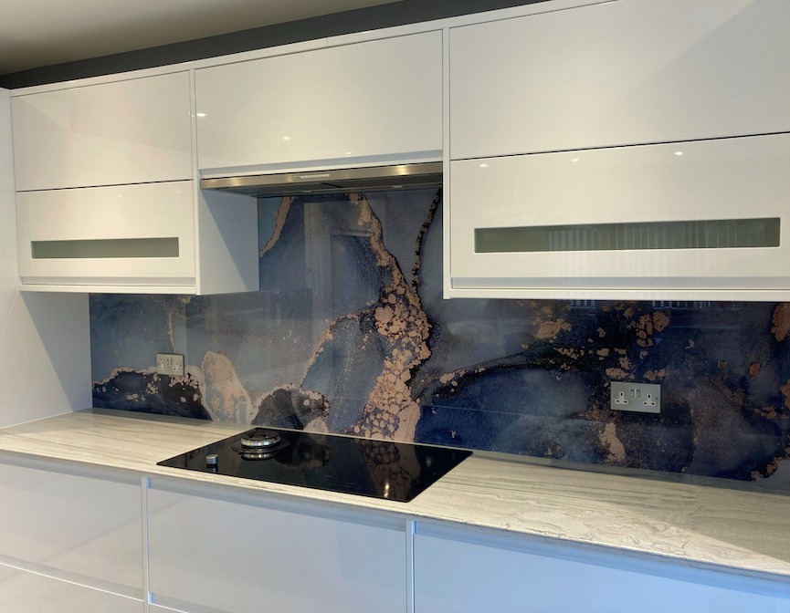 white kitchen with marble effect splashback