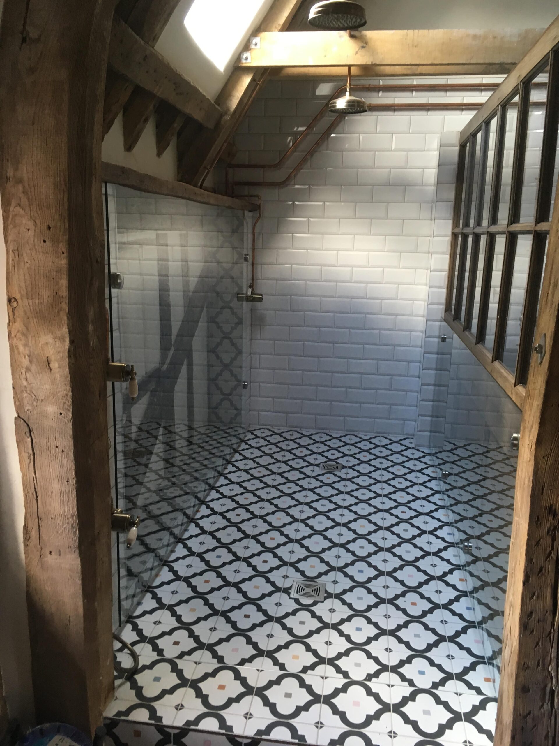 glass timber and tiled walk in shower