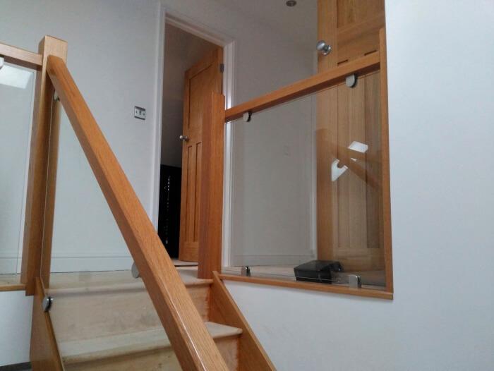 glass balustrade and wooden balustrades